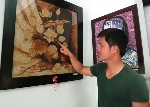 Bức tranh gạo của họa sĩ khiếm thính