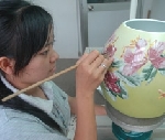 Chìm màu vào men, nung lửa hoàn nguyên