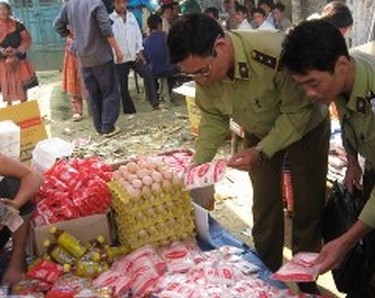 Tổng kết công tác chống buôn lậu, hàng giả, gian lân thương mại năm 2014